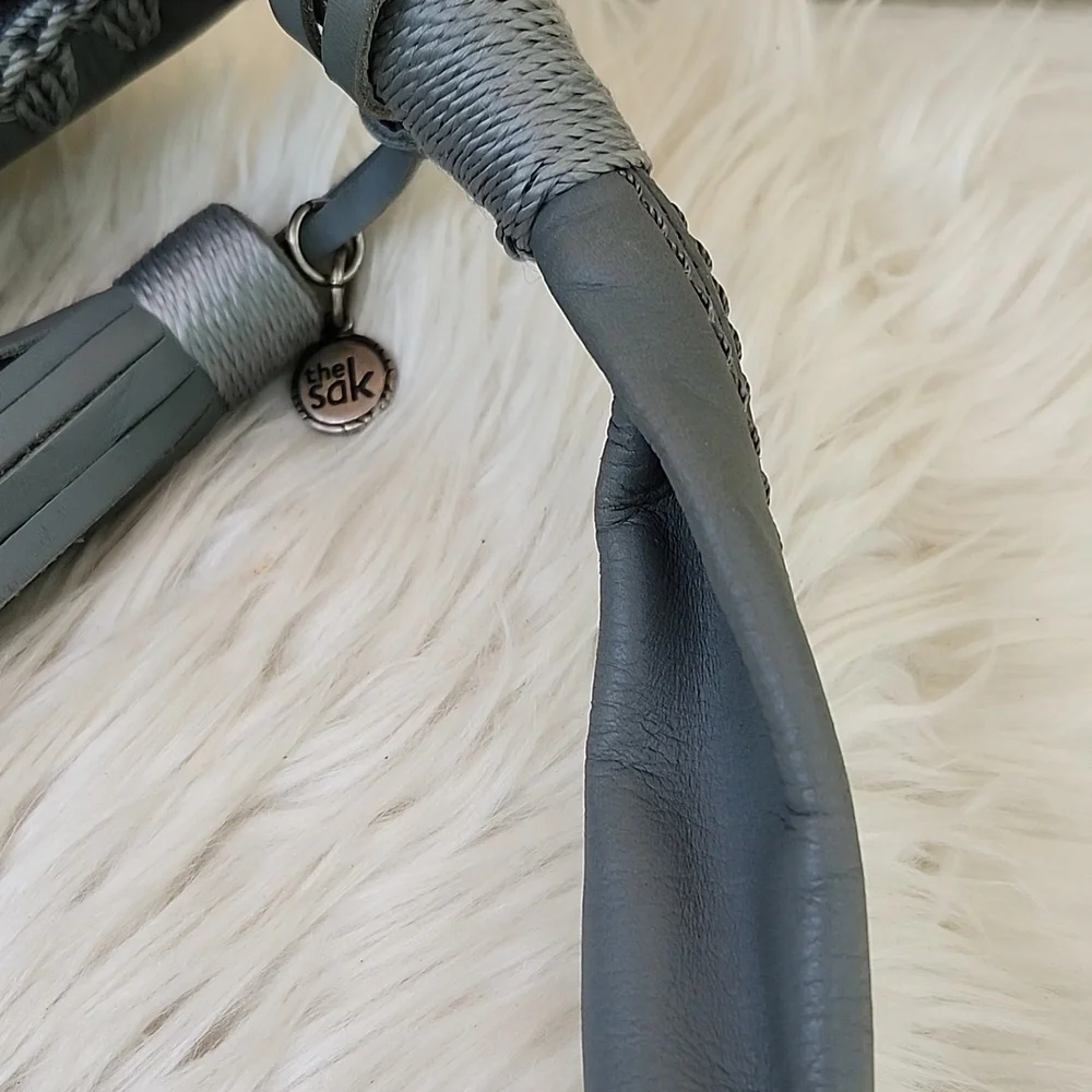 The Sak zip closure trim