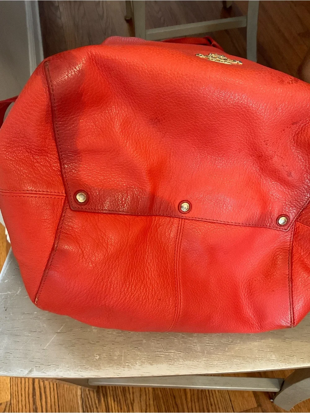 Coach closure gold subtle