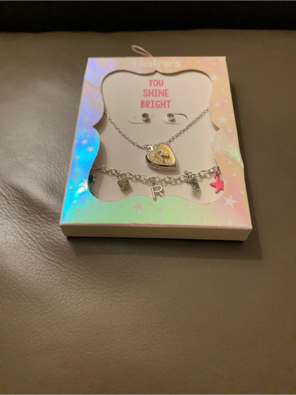 Claires matching locket