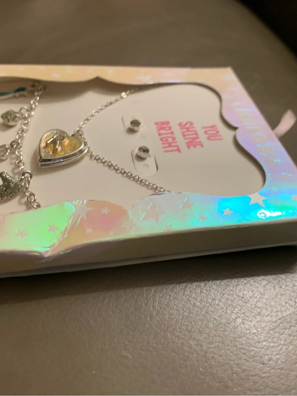 Claires matching locket