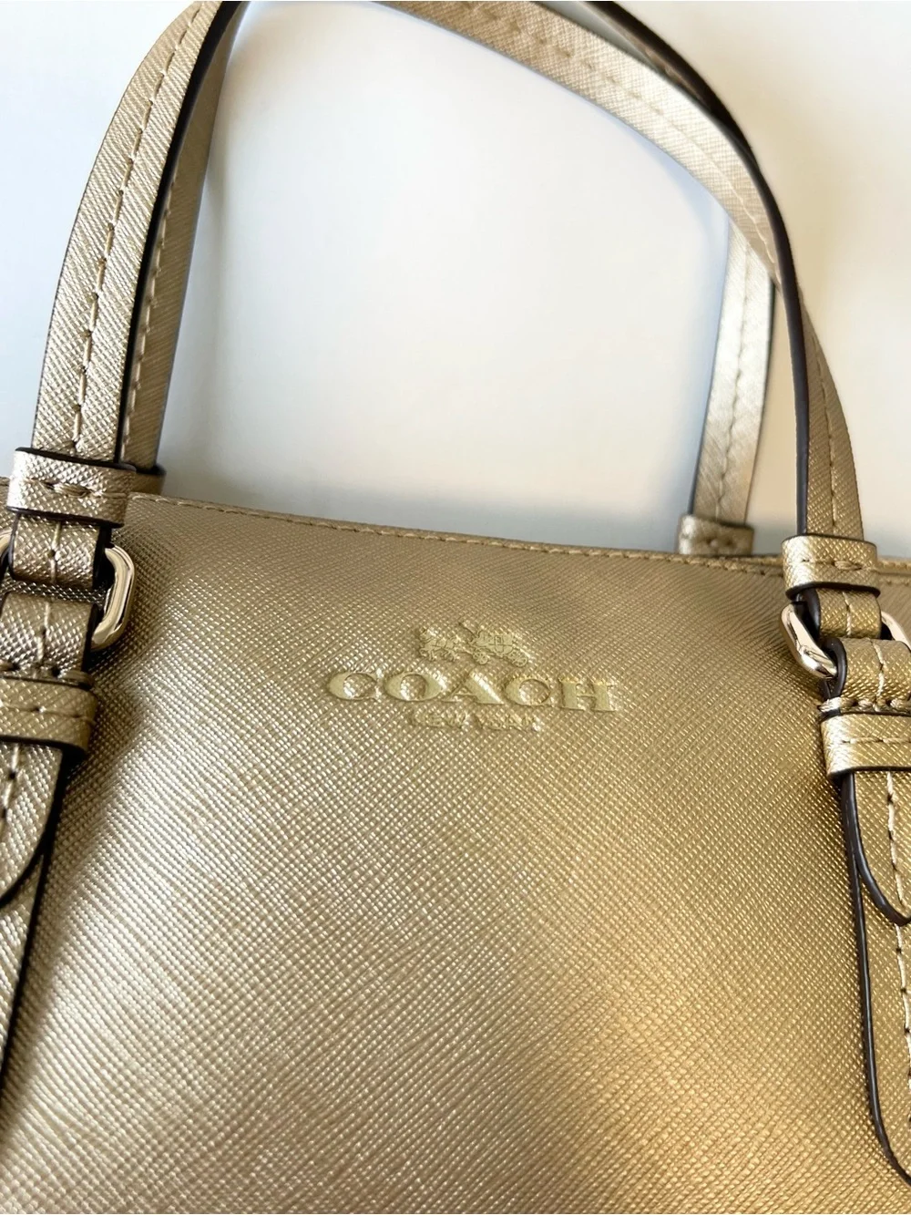 Coach gold leather