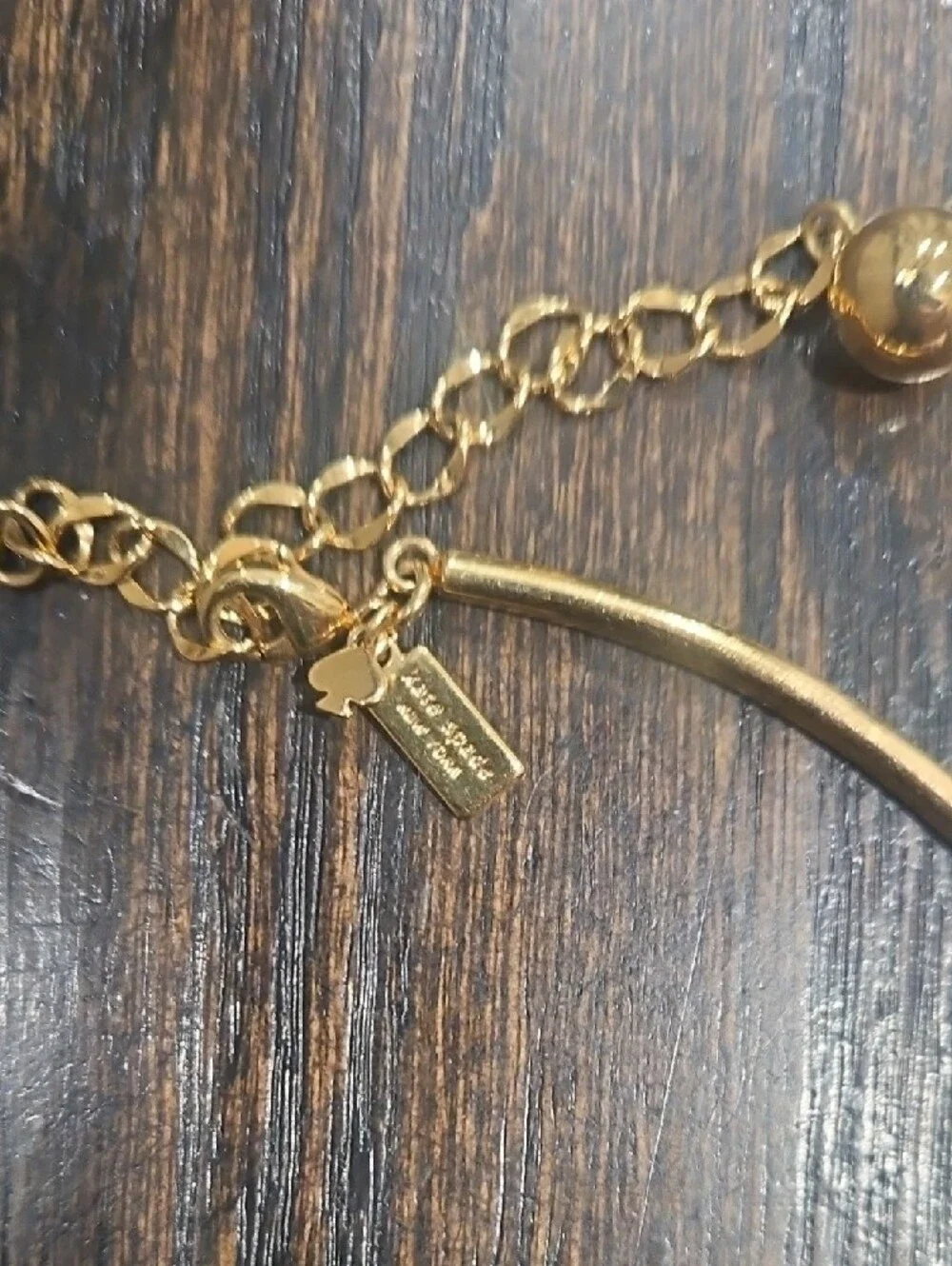 kate spade gold tone