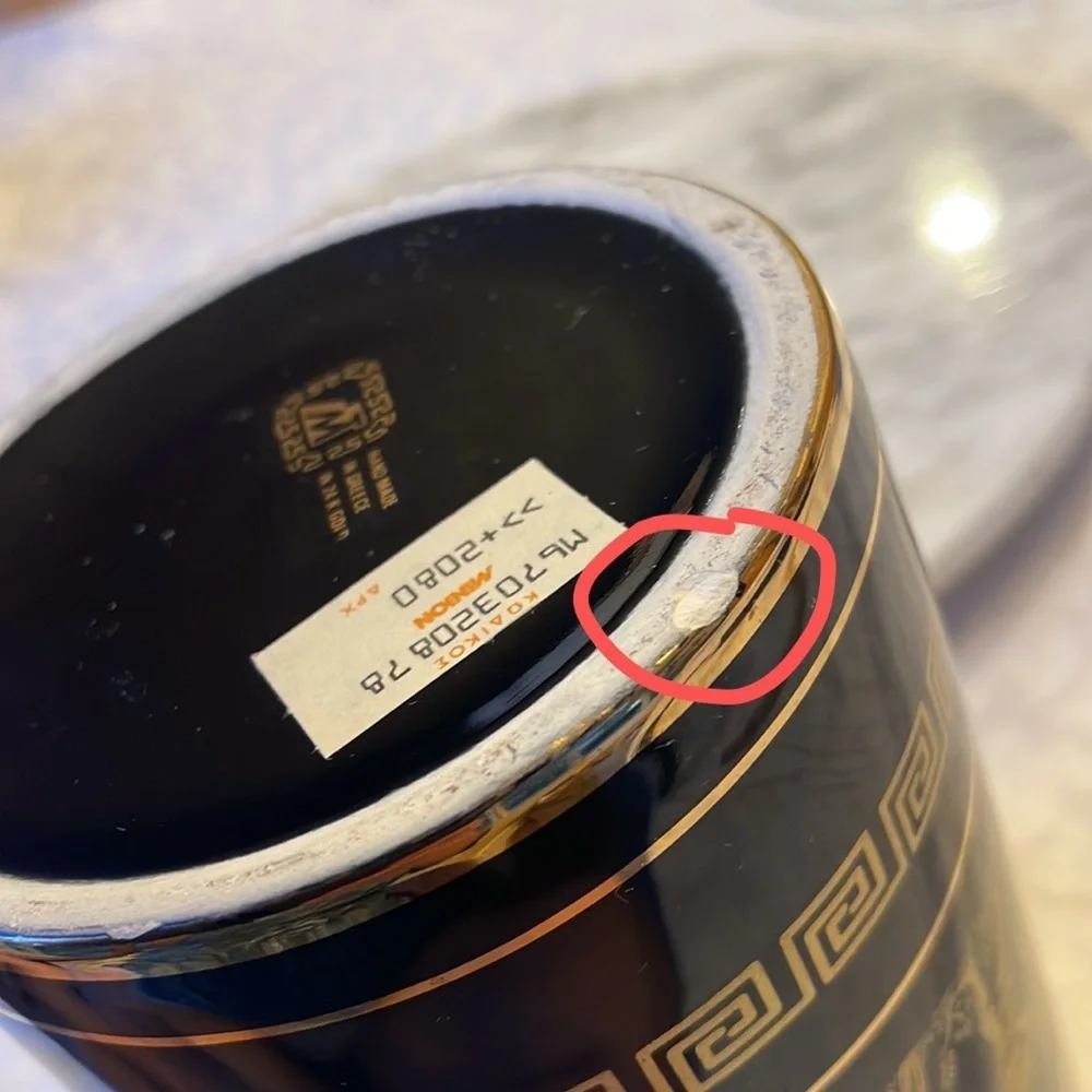 Source Unknown black vase