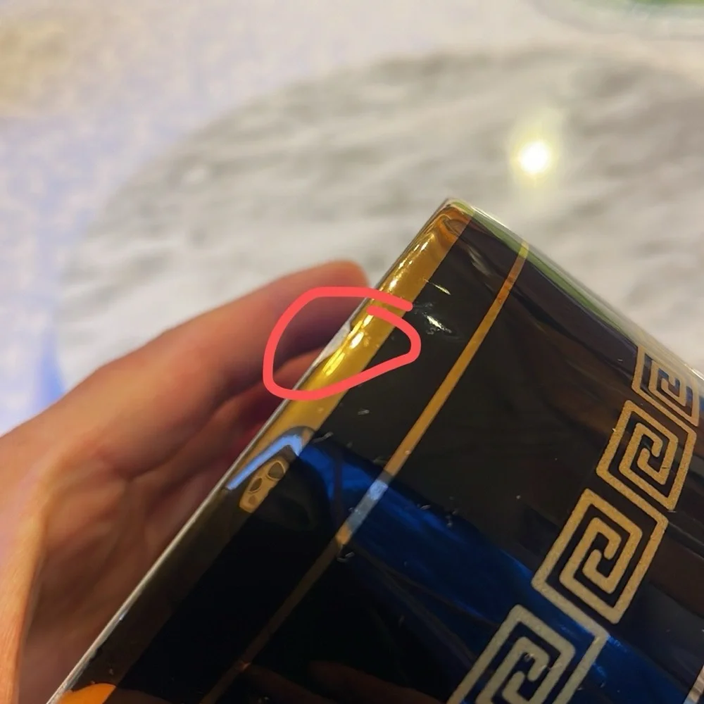 Source Unknown black vase