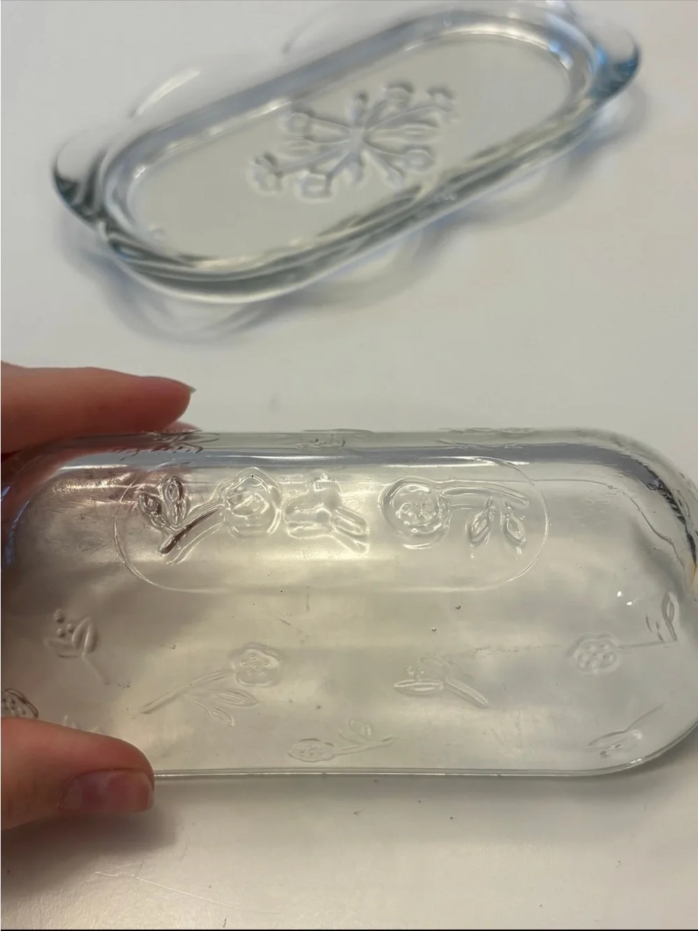 Anchor Hocking Savannah butter dish features a pressed clear glass design flower