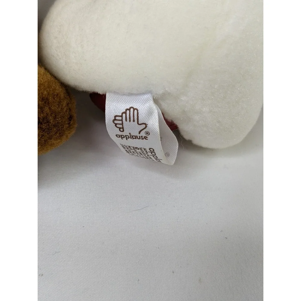 Applause plush brown owned