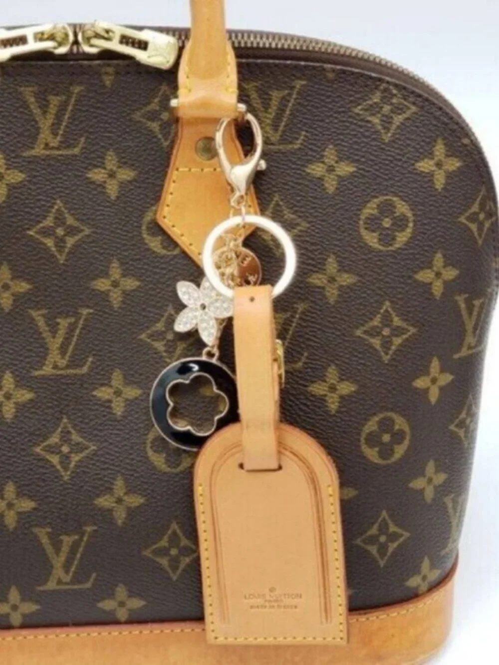 Louis Vuitton “100% authentic