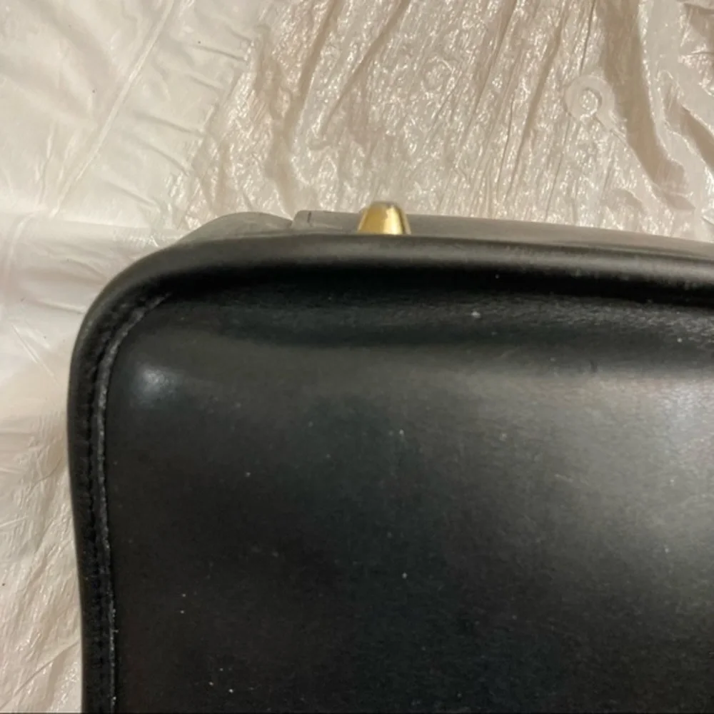 Coach scuffs scratched