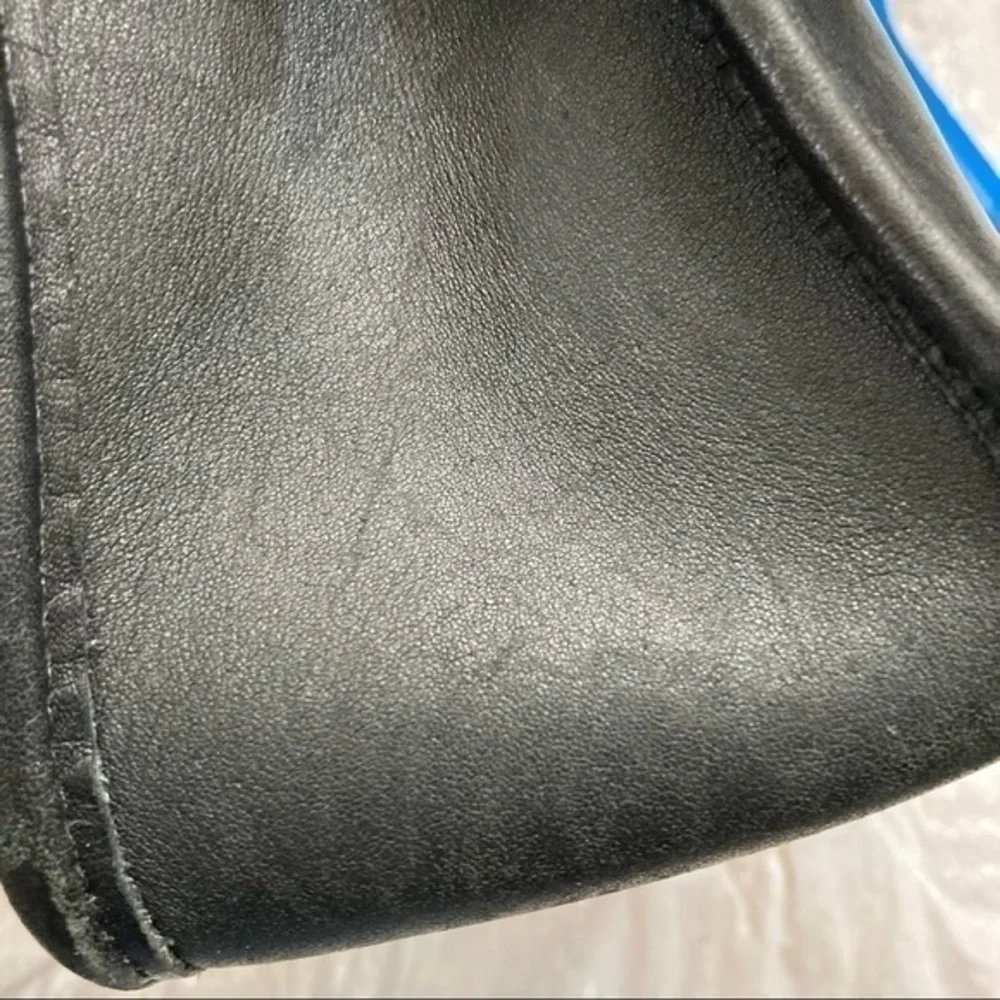 Coach scuffs scratched