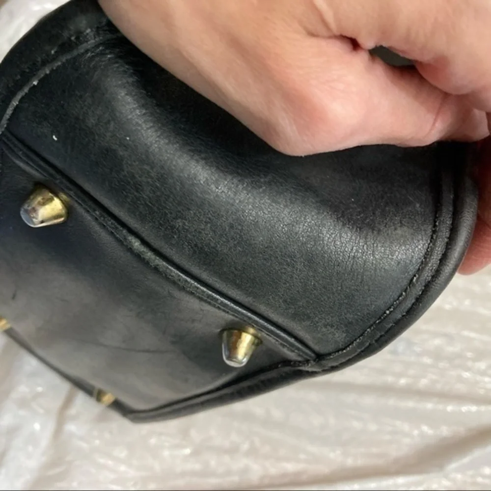 Coach scuffs scratched
