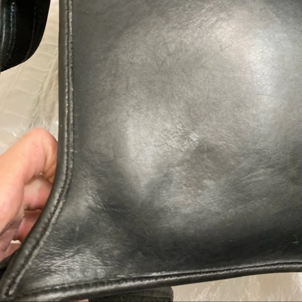 Coach scuffs scratched