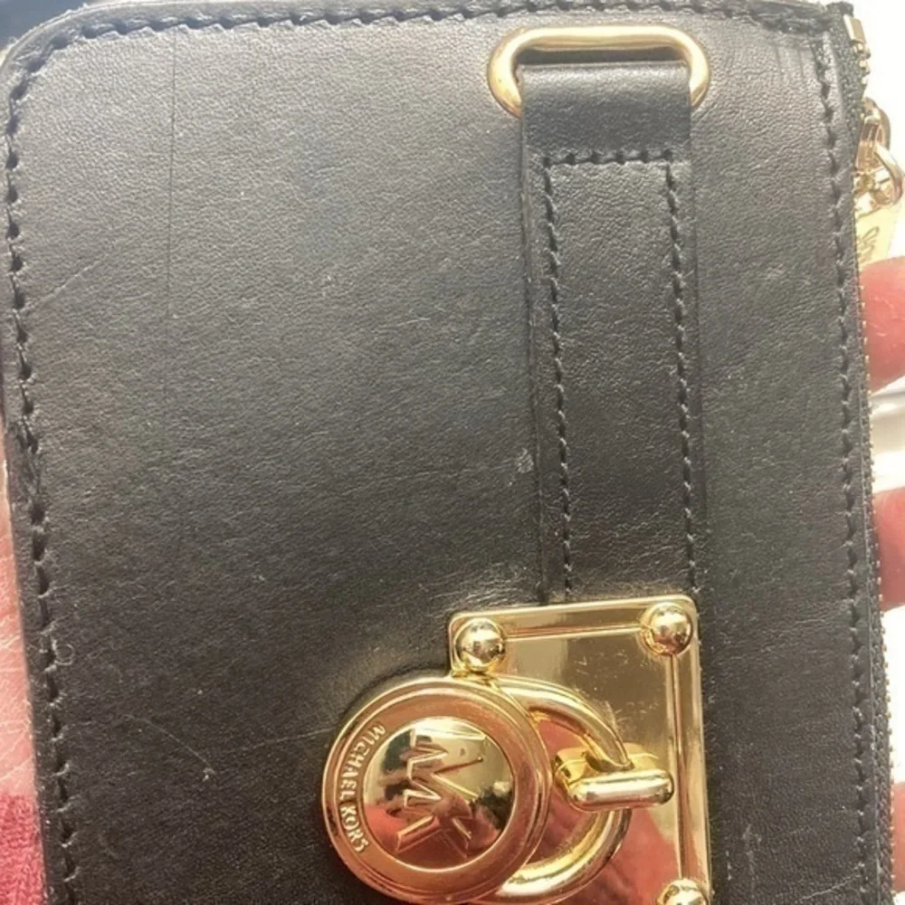Michael Kors indentations some scuffs