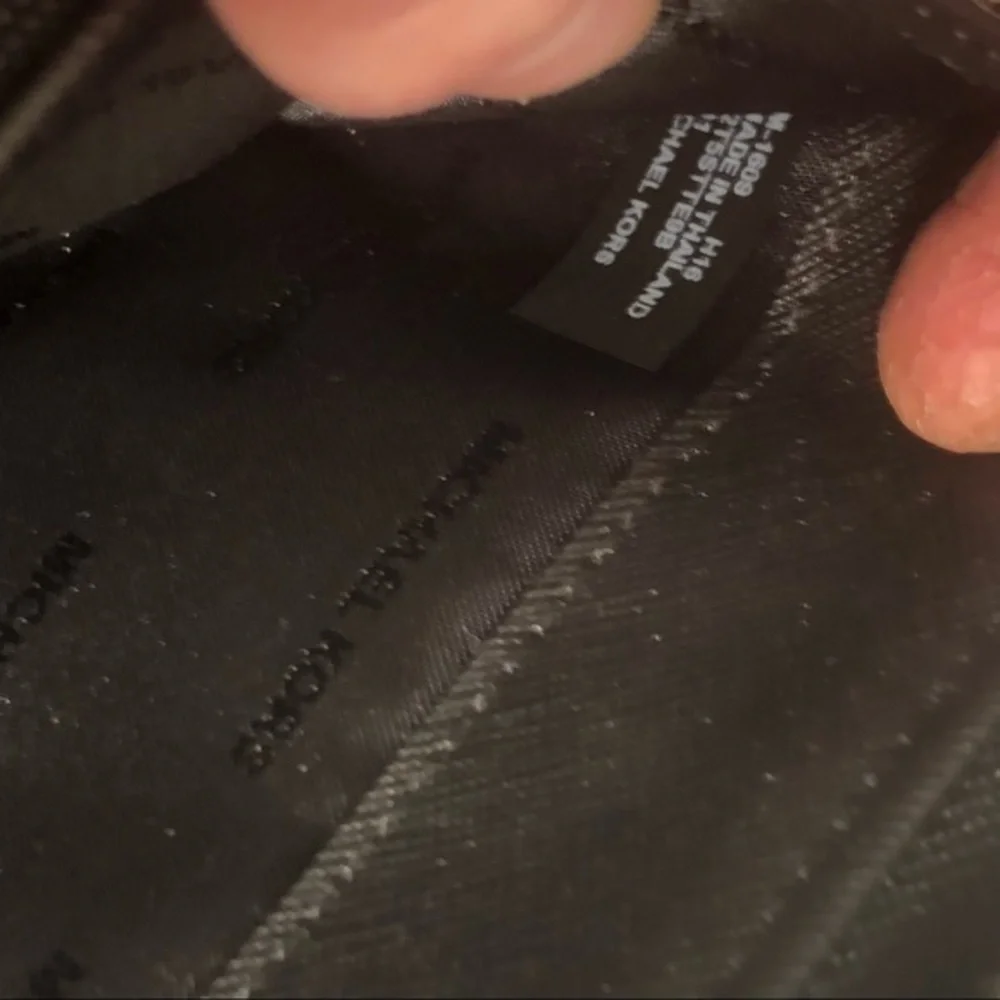 Michael Kors missing wristlet