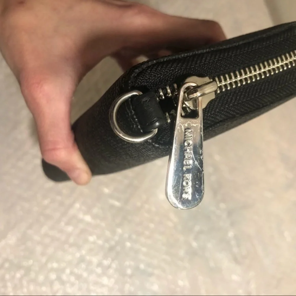 Michael Kors missing wristlet