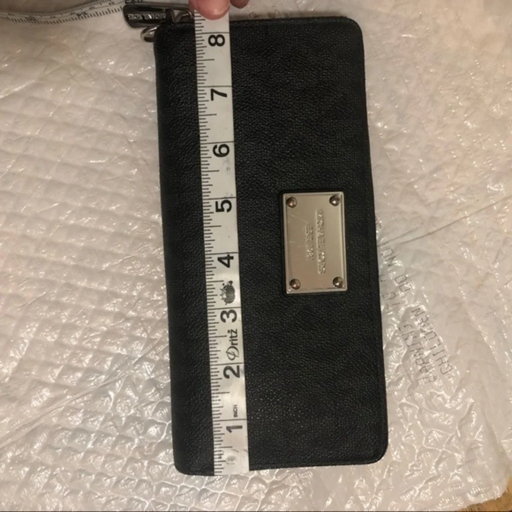 Michael Kors missing wristlet