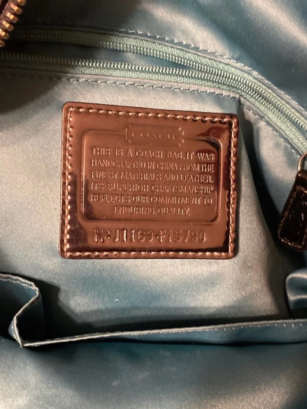Coach shiny black