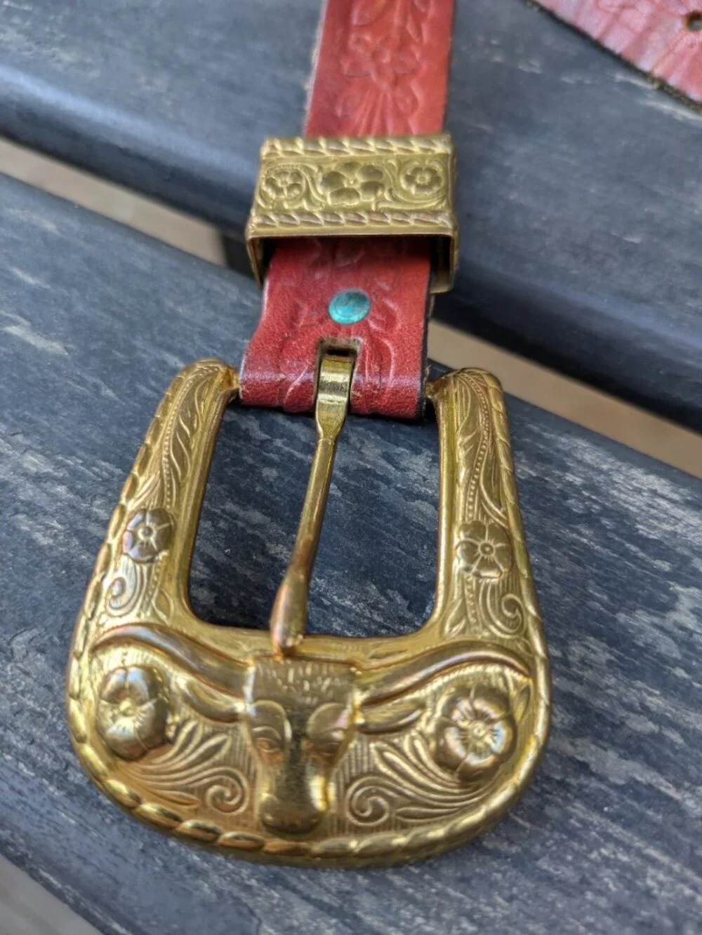 Vintage Western ranger-style leather belt with red finish & gold-tone hardware.