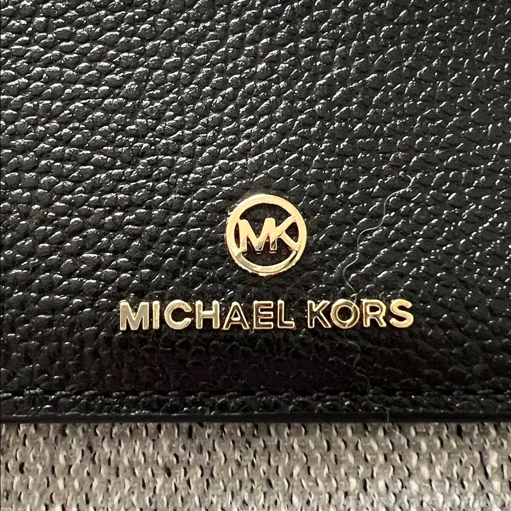 Michael Kors its function this