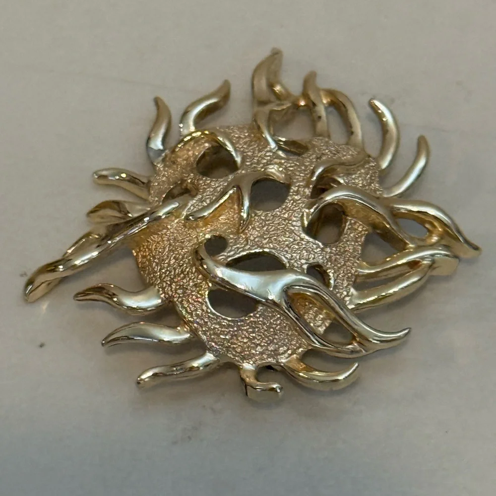 Sarah Coventry elegant gold