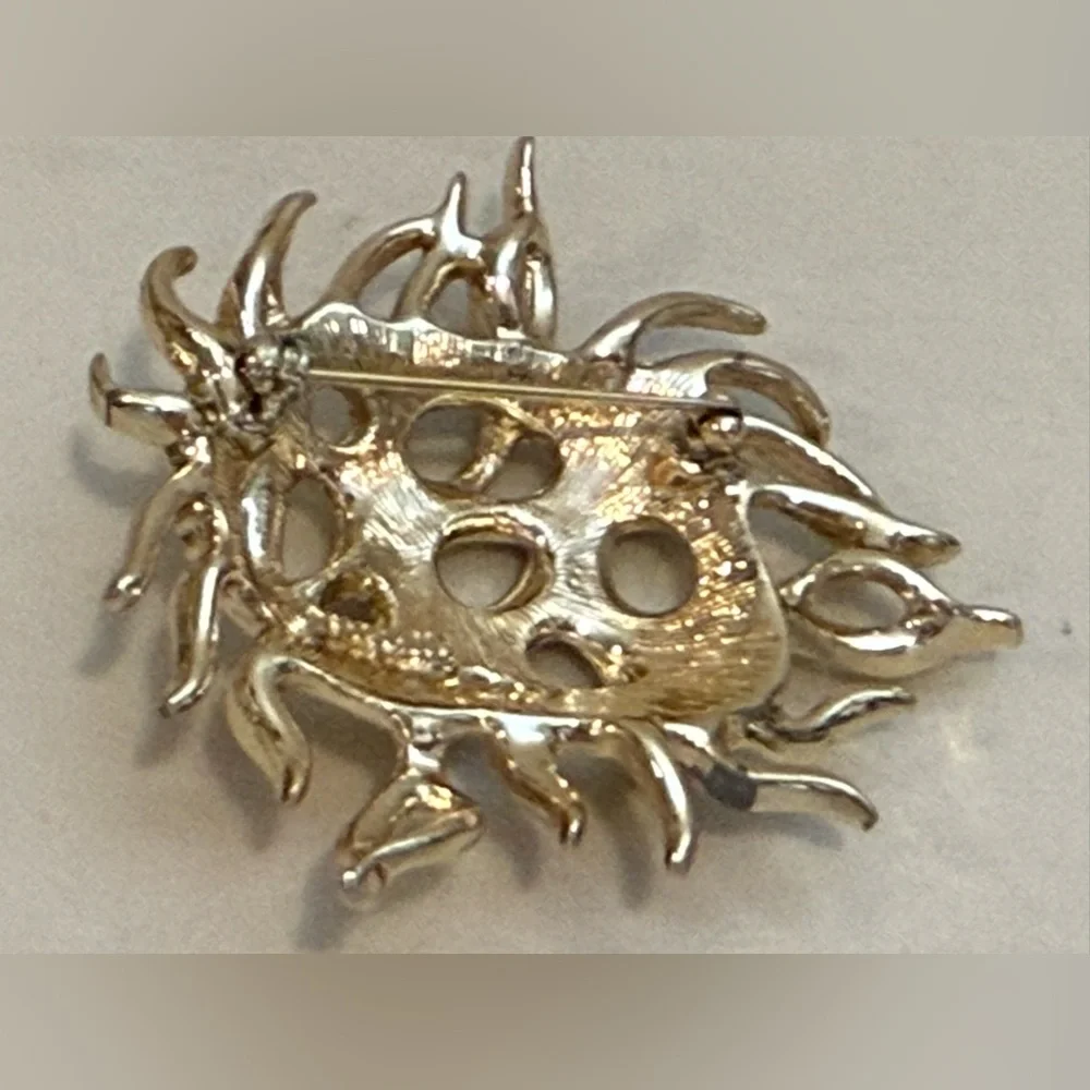 Sarah Coventry elegant gold