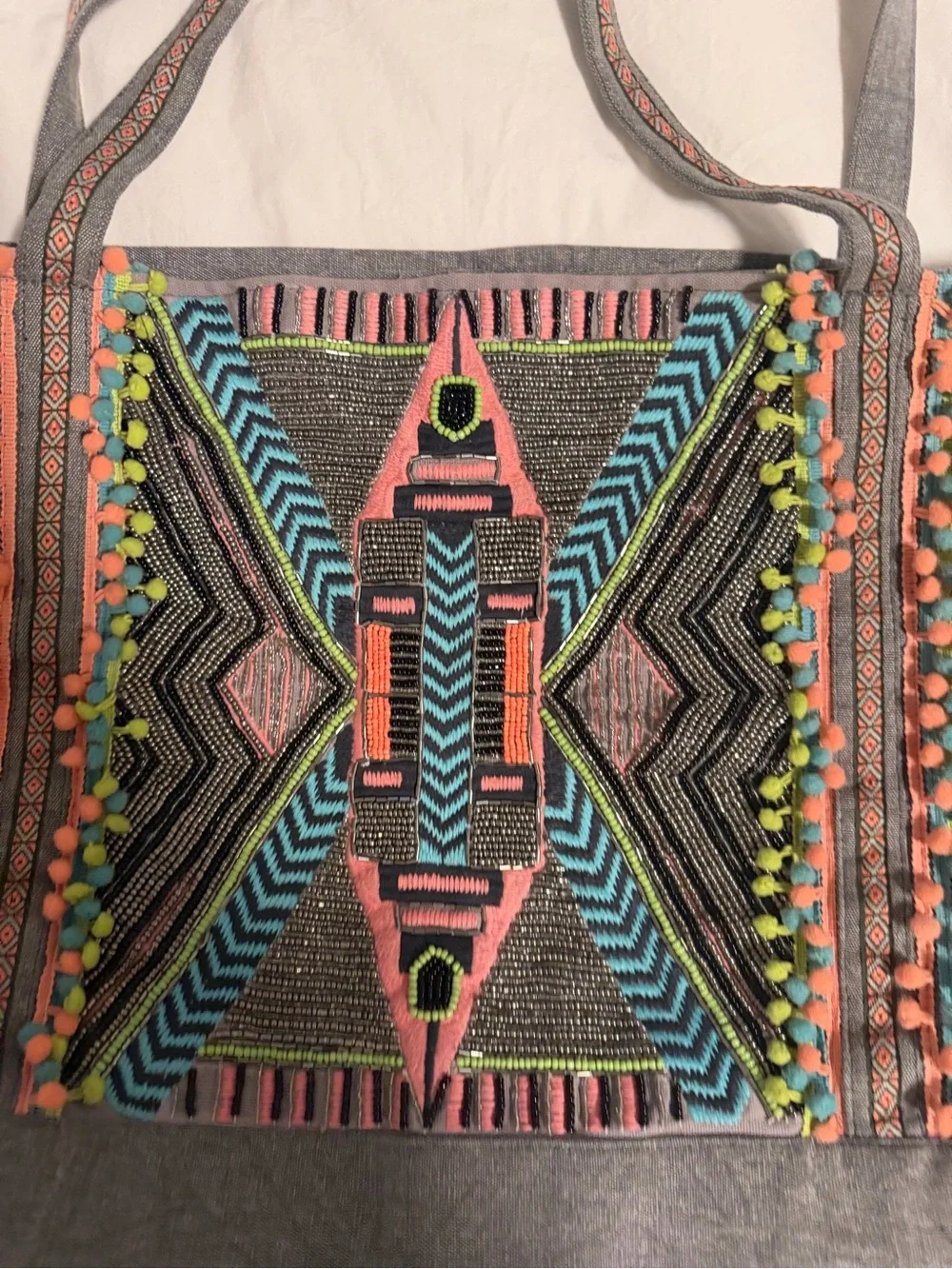 America & Beyond embroidered adds