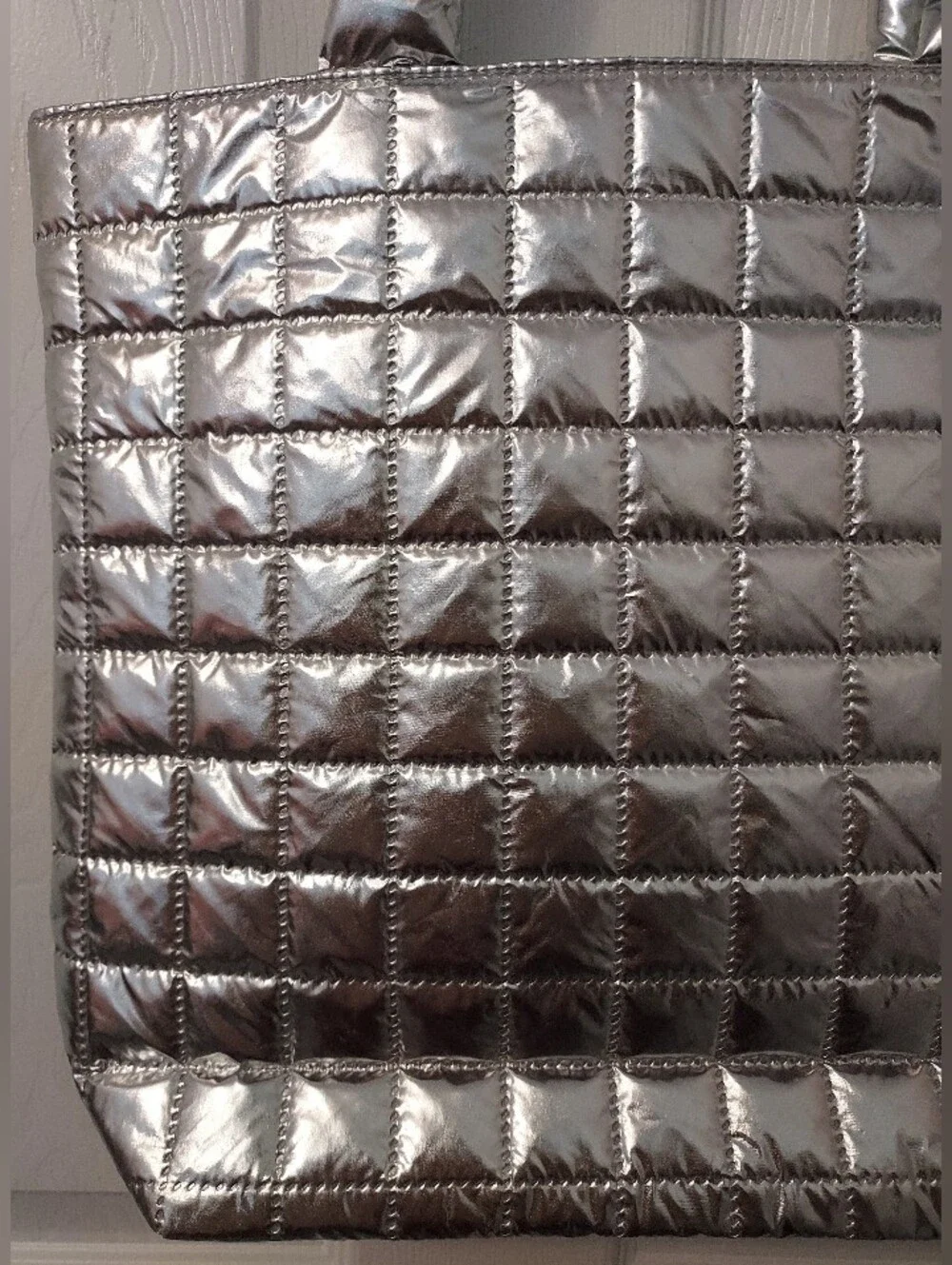 Clinique silver quilted