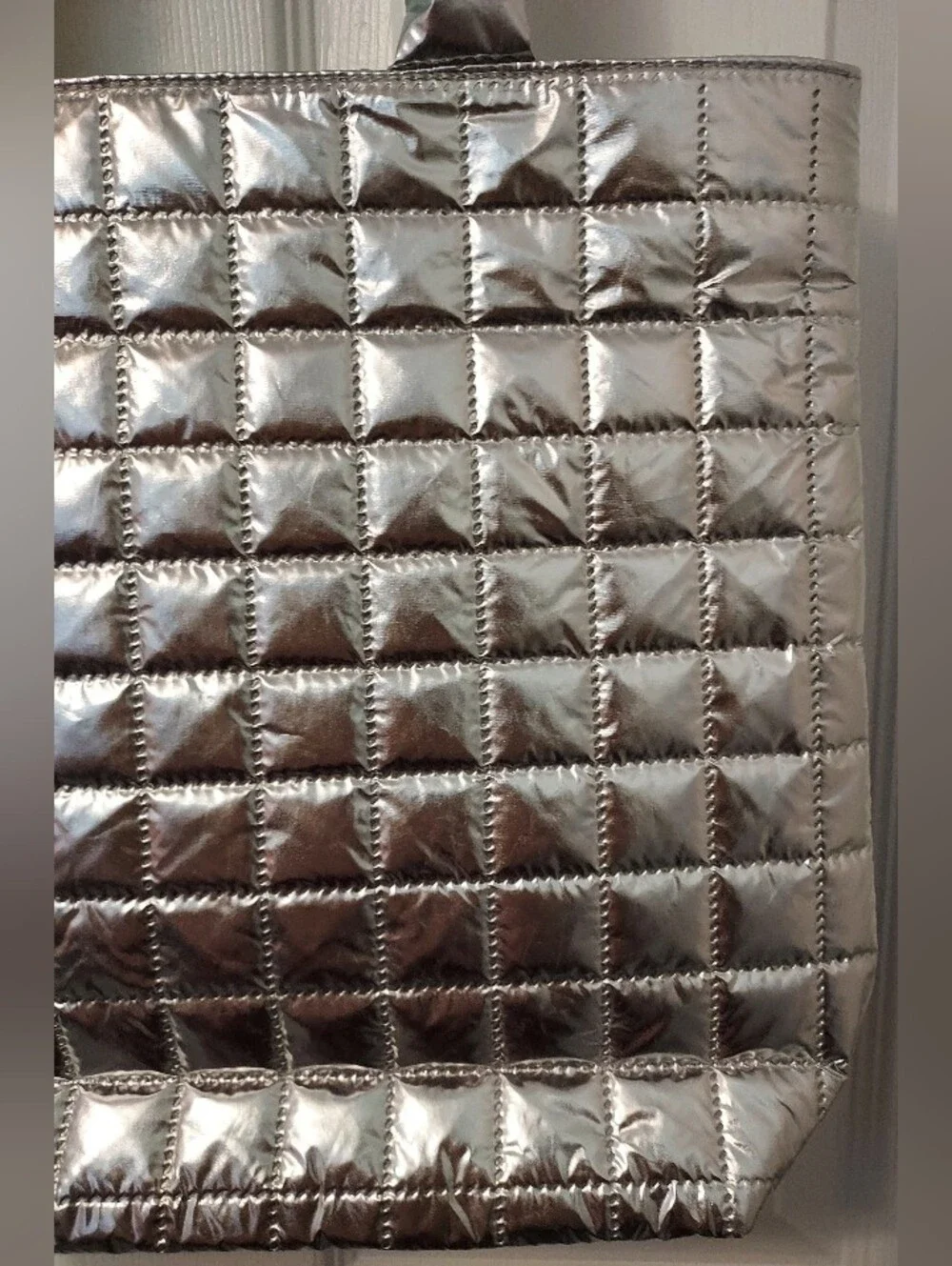 Clinique silver quilted