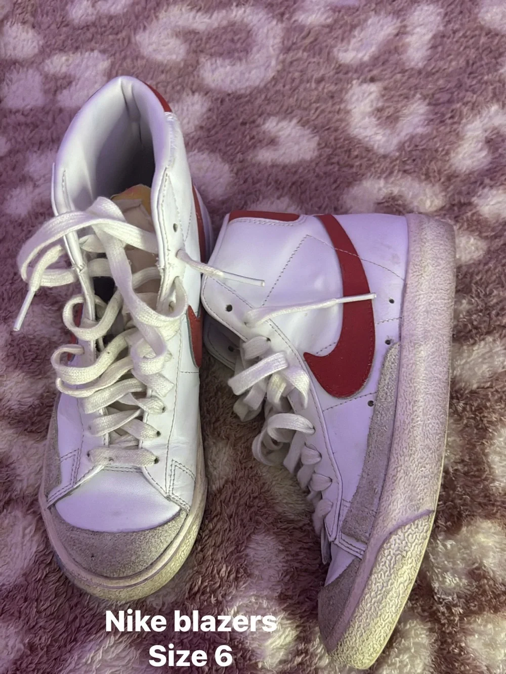 Nike Women’s White High-Top Sneakers with Red Swoosh