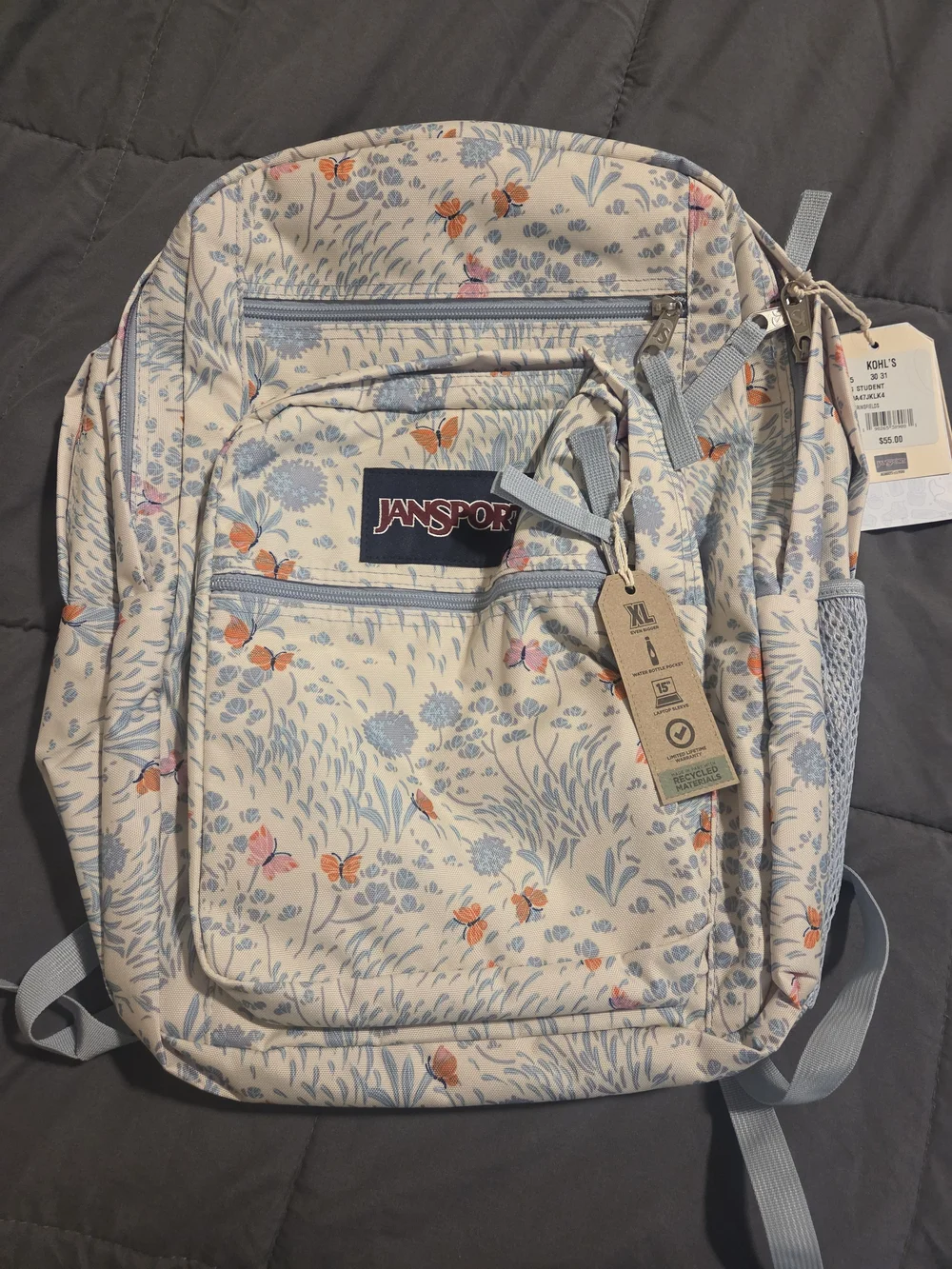 Jansport Floral Cream and Light Blue Backpack with Orange Accents