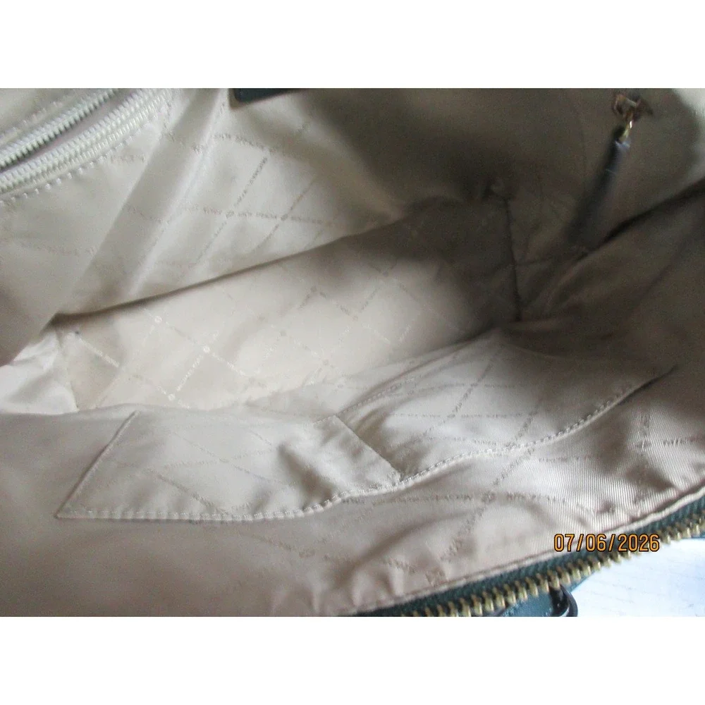 Michael Kors pockets this 12