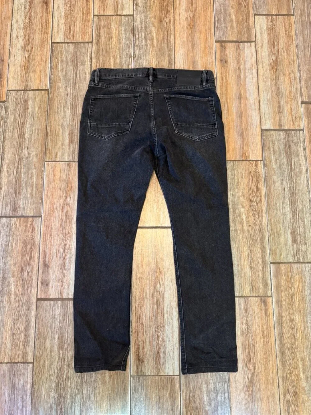 Roark jeans worn