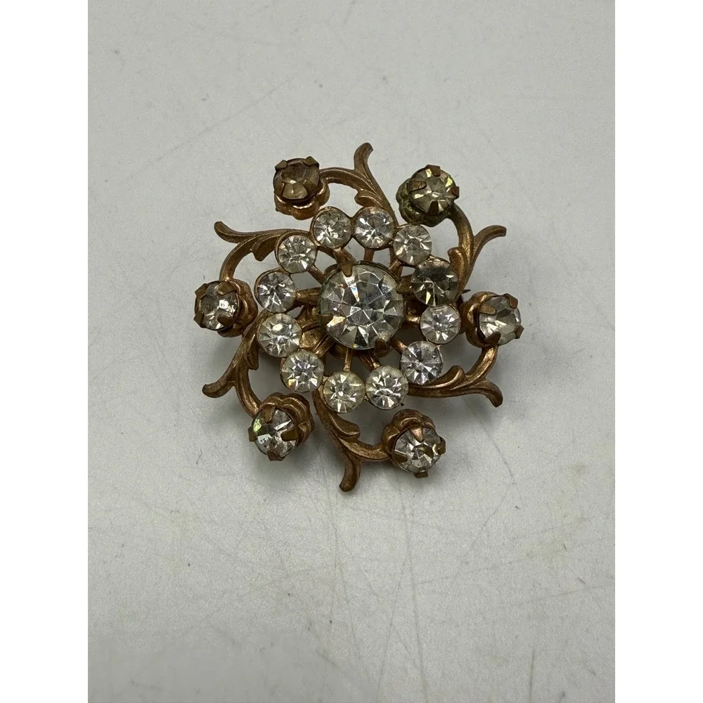 Vintage Gold Tone Clear Rhinestone Floral Sunburst Brooch Pin Round 1.25 Inch