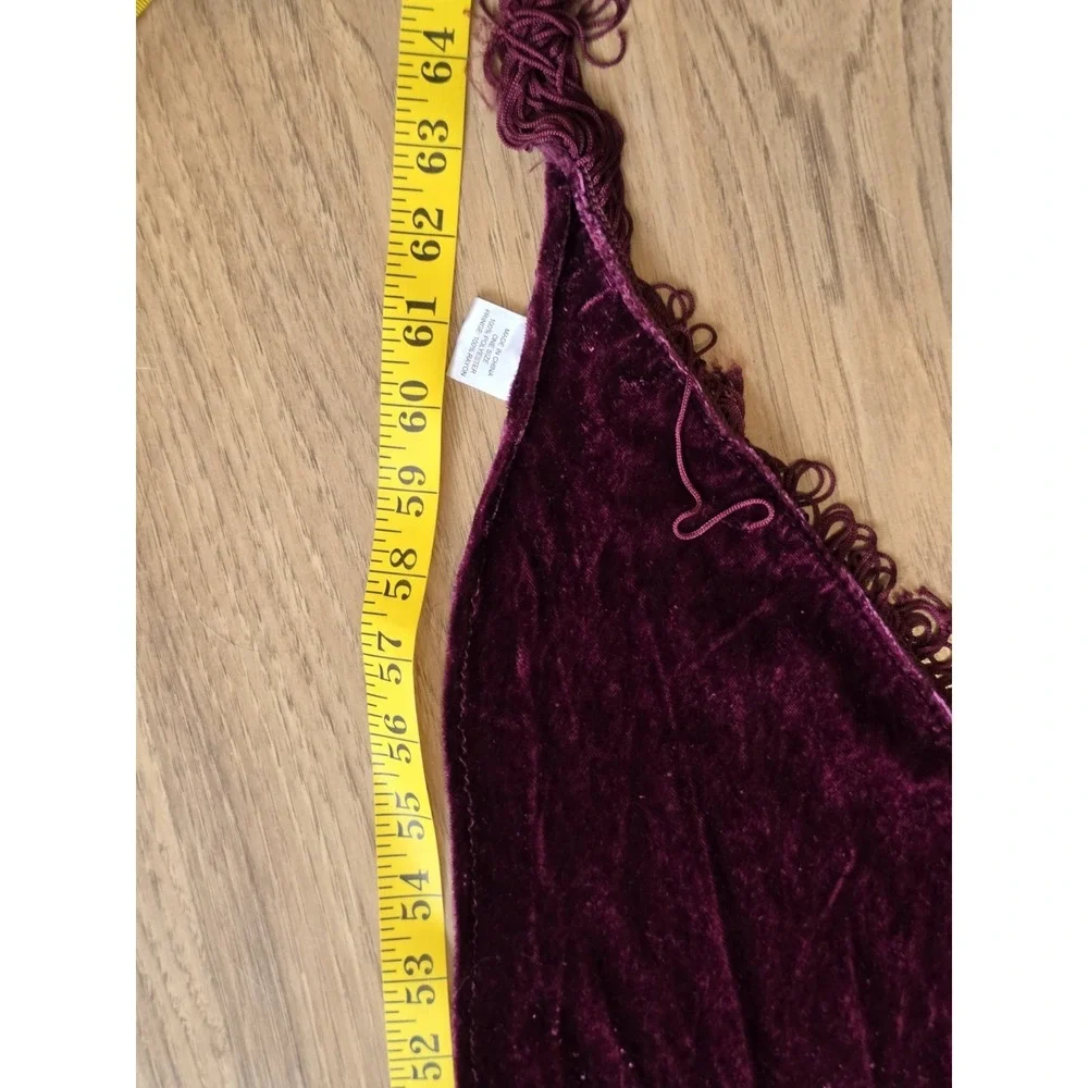 Wrap London tassels hole