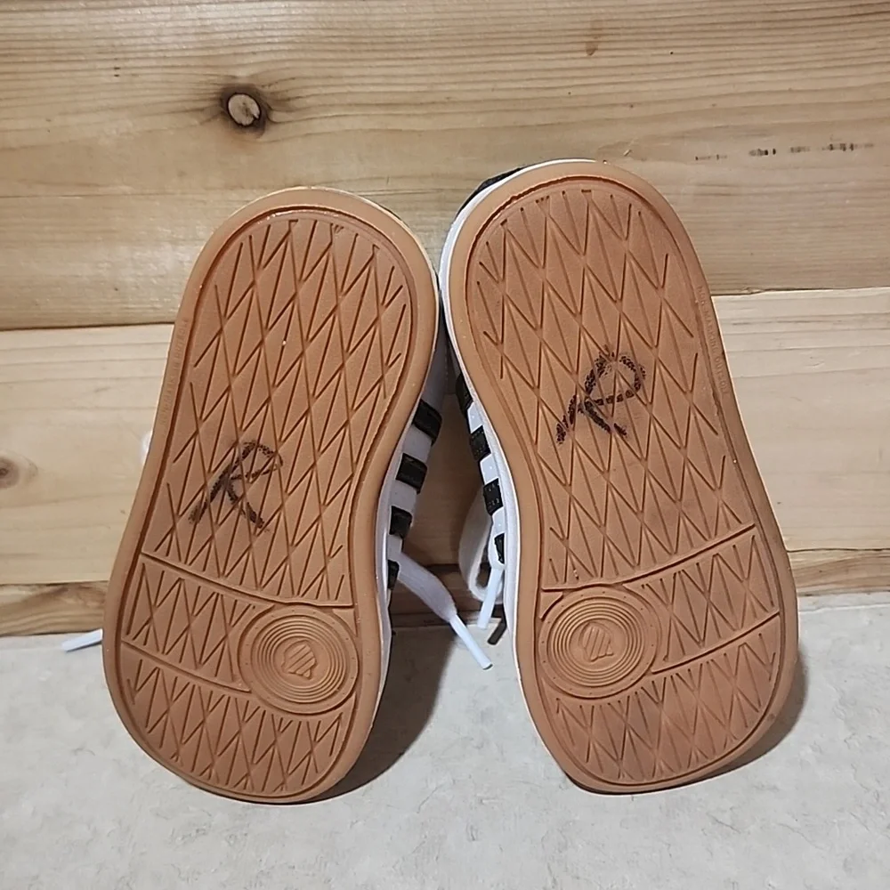 K-Swiss size rips