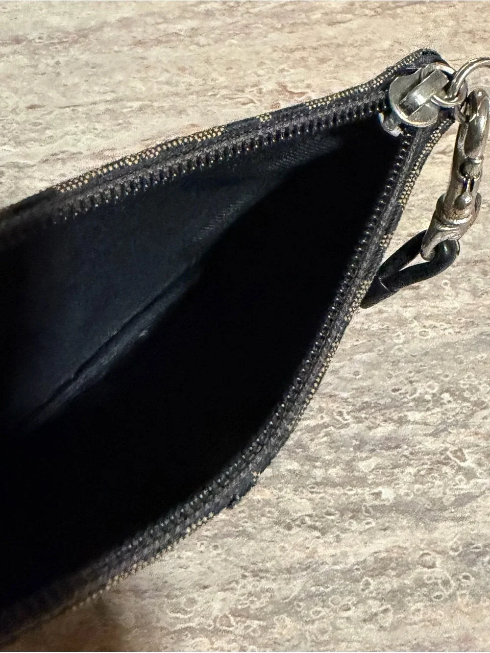 Coach Signature Canvas Wristlet with leather trim and handle