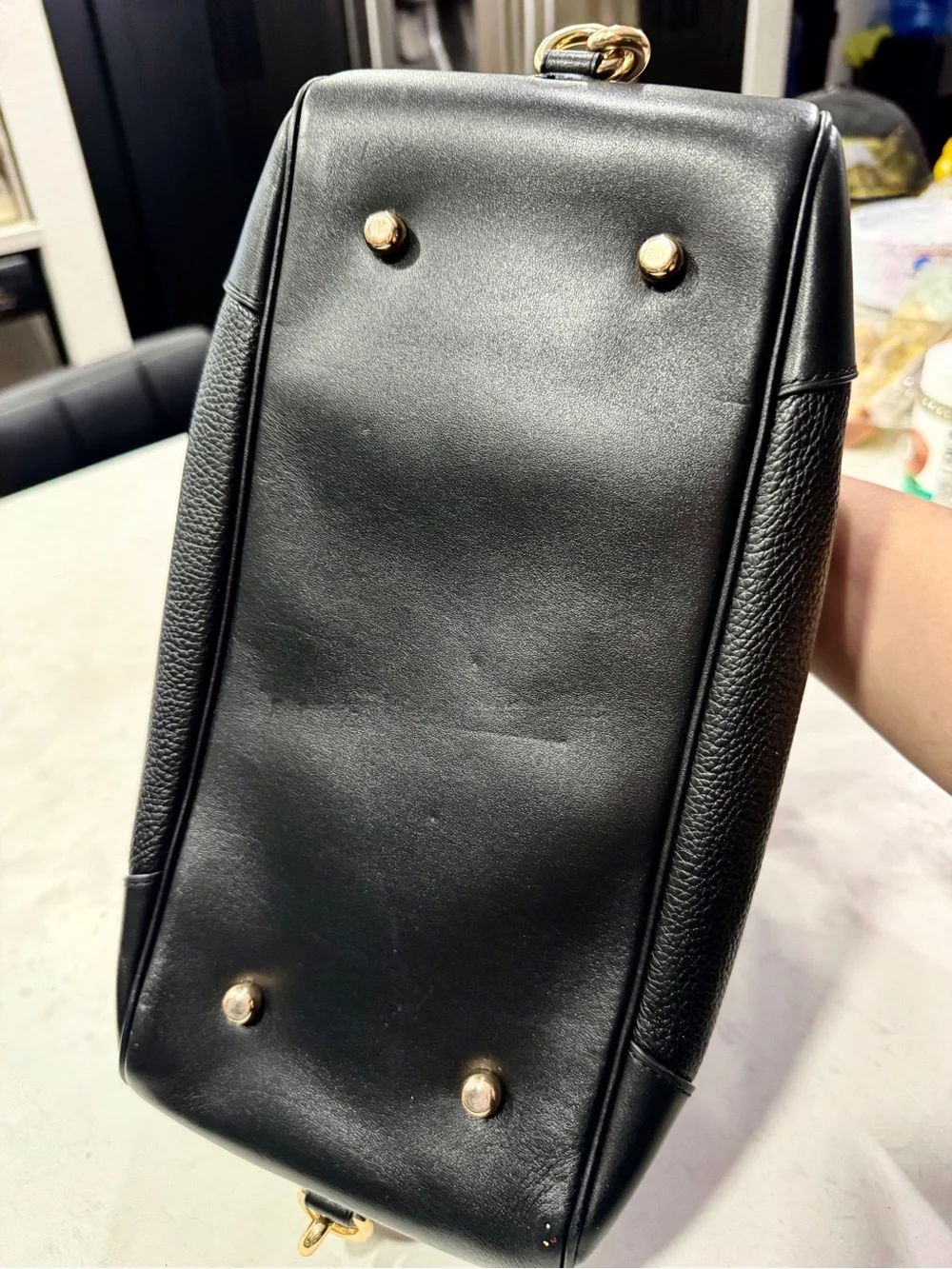 Coach polished pebble
