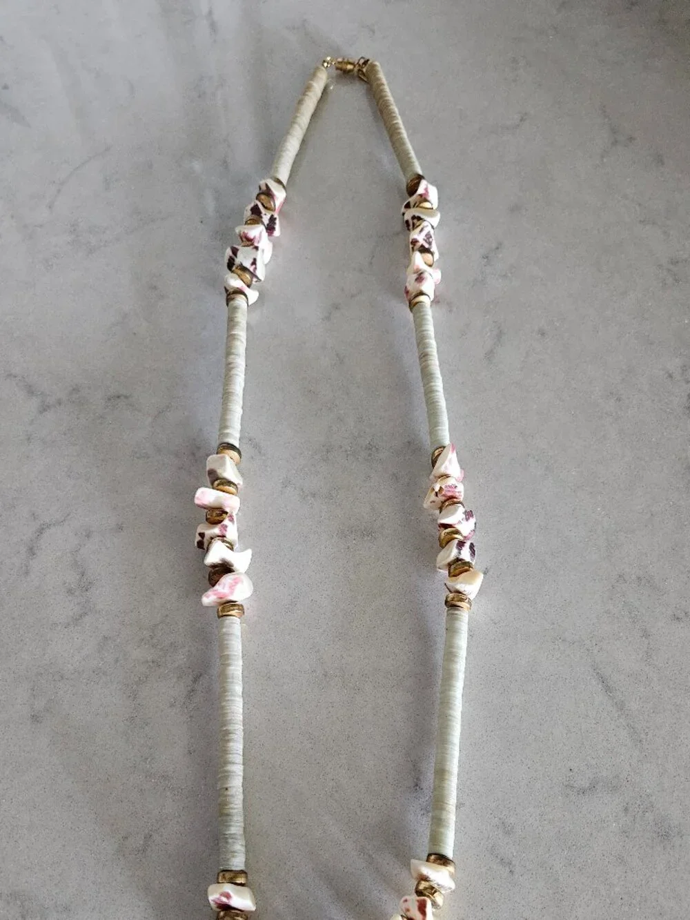 RARE AND VINTAGE KENNETH LANE PUKA / HEISHA SHELL NECKLACE WITH SHELL FRAGMENTS