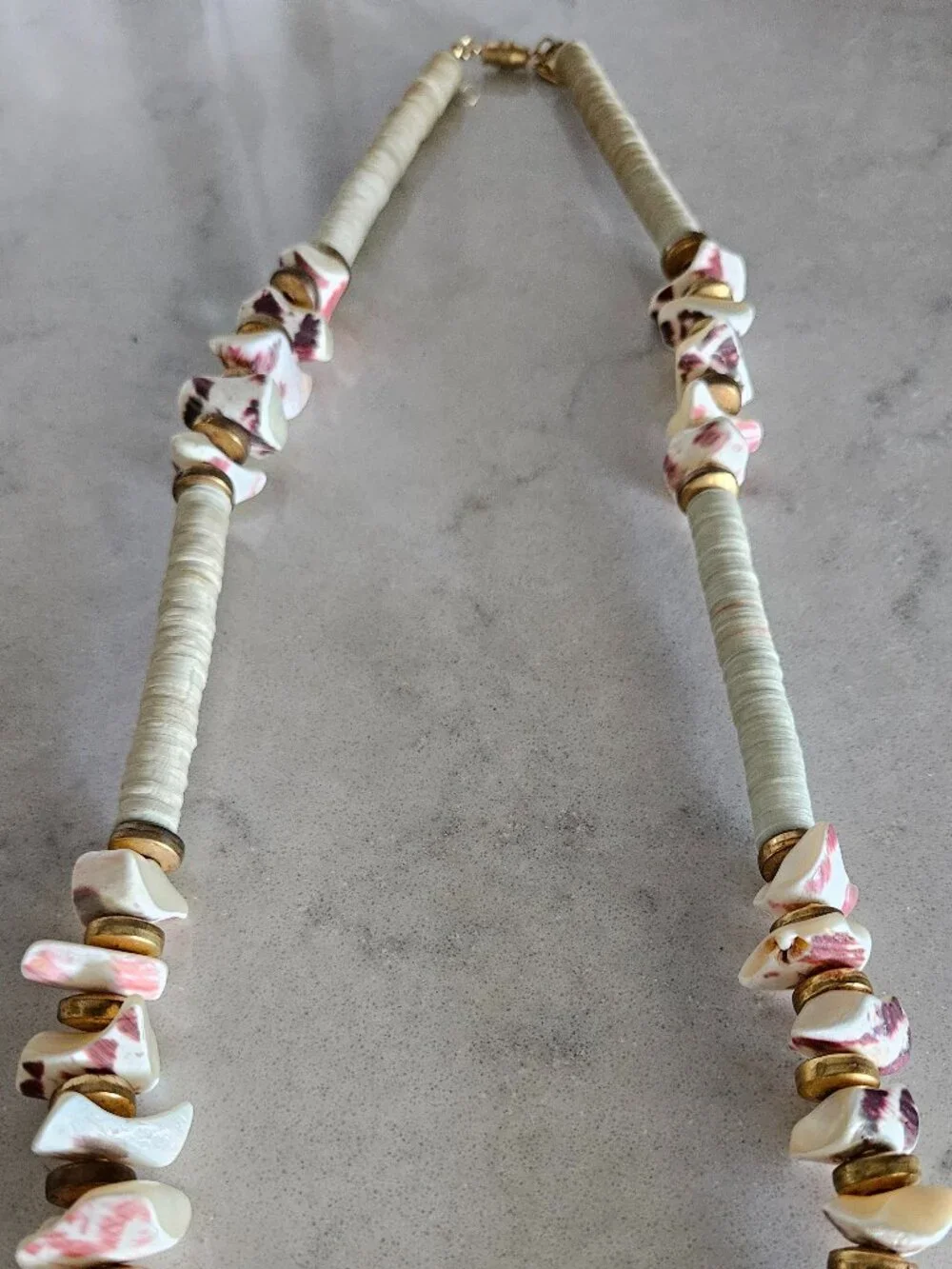 RARE AND VINTAGE KENNETH LANE PUKA / HEISHA SHELL NECKLACE WITH SHELL FRAGMENTS