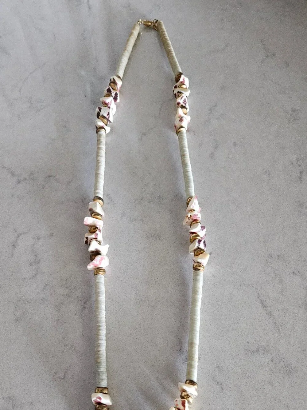 RARE AND VINTAGE KENNETH LANE PUKA / HEISHA SHELL NECKLACE WITH SHELL FRAGMENTS