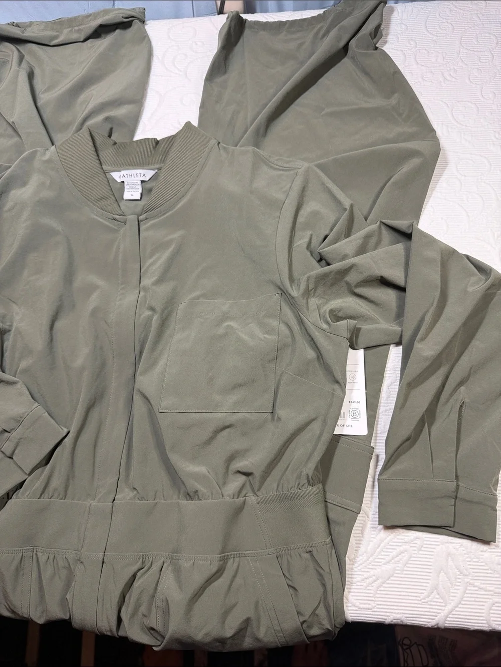 Athleta Brooklyn long sleeve jumpsuit. Size 16 deep green NWT.