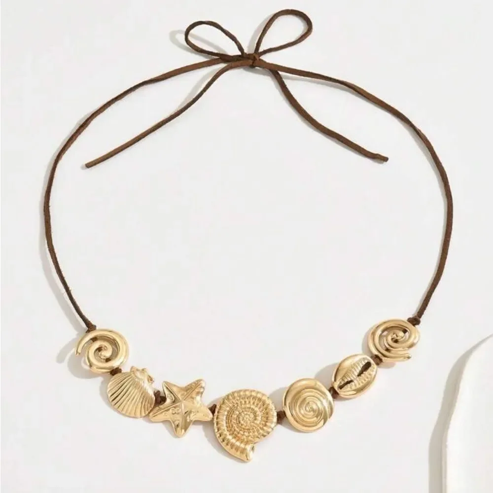 Anthropologie elegant gold