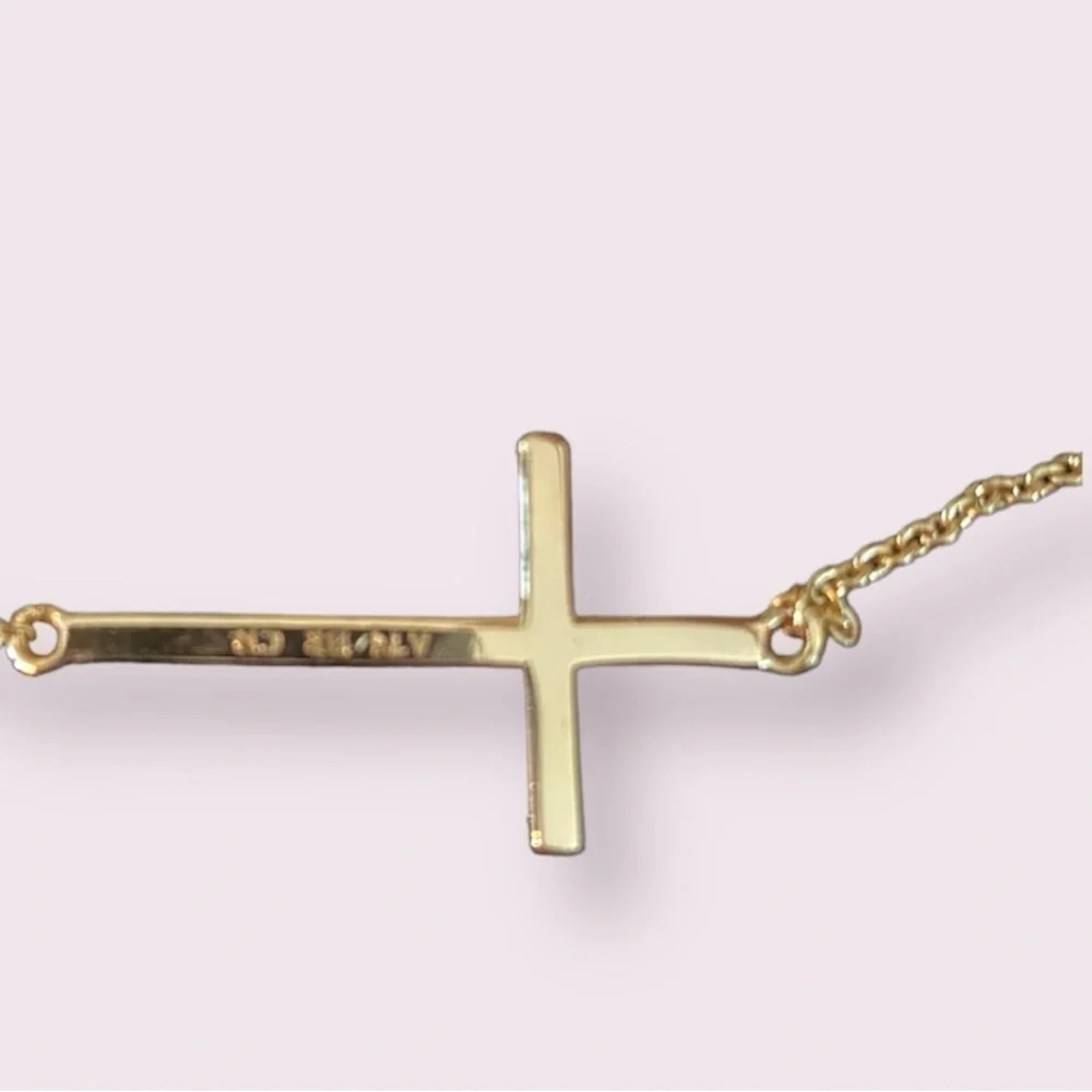 N/A cross gold