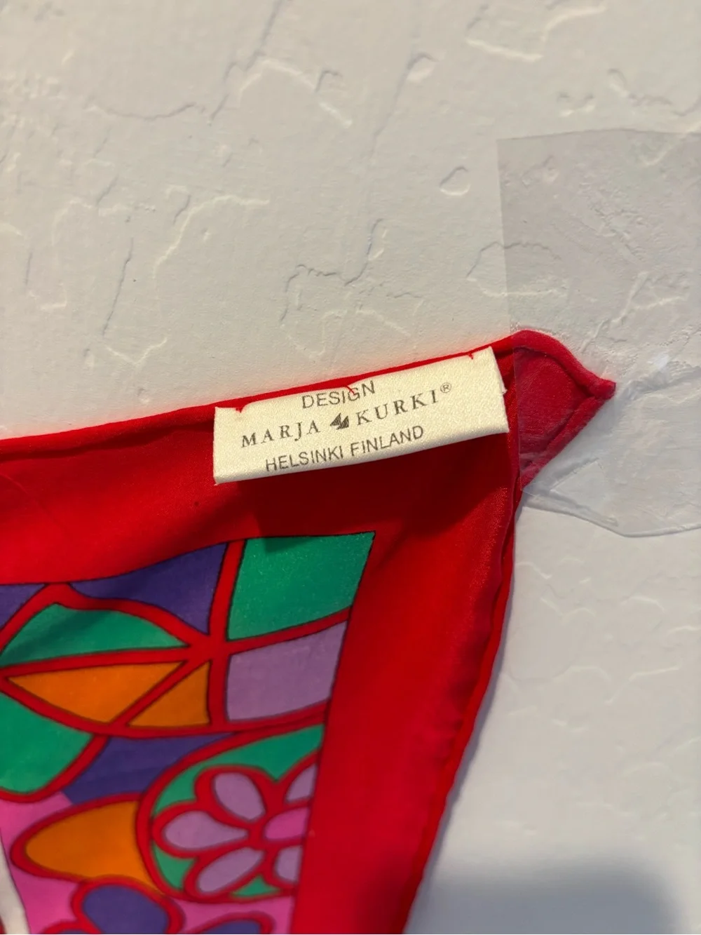 Marja Kurki vibrant red
