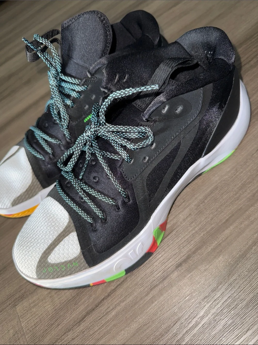 Jordan Black High-Top Sneaker with Green Jumpman and Multicolor Sole
