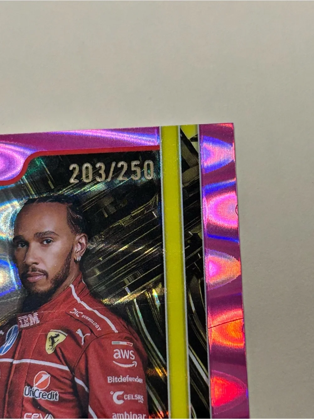 Topps White Racing Card with Red and Yellow Accents