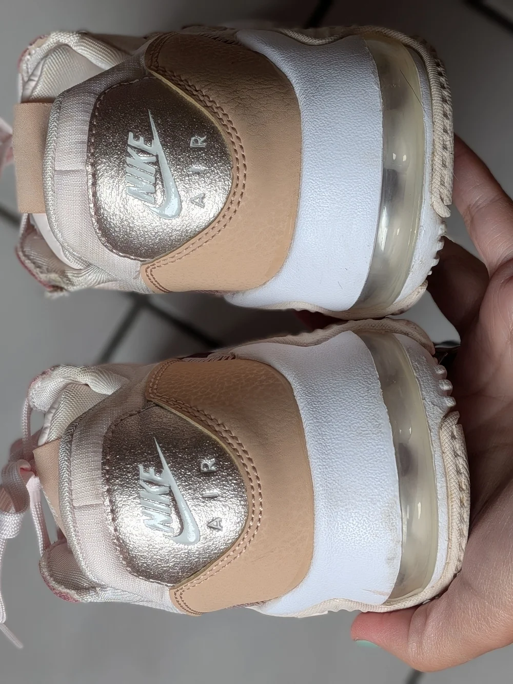 Nike Women’s Sneakers in Blush with Metallic Rose Accent