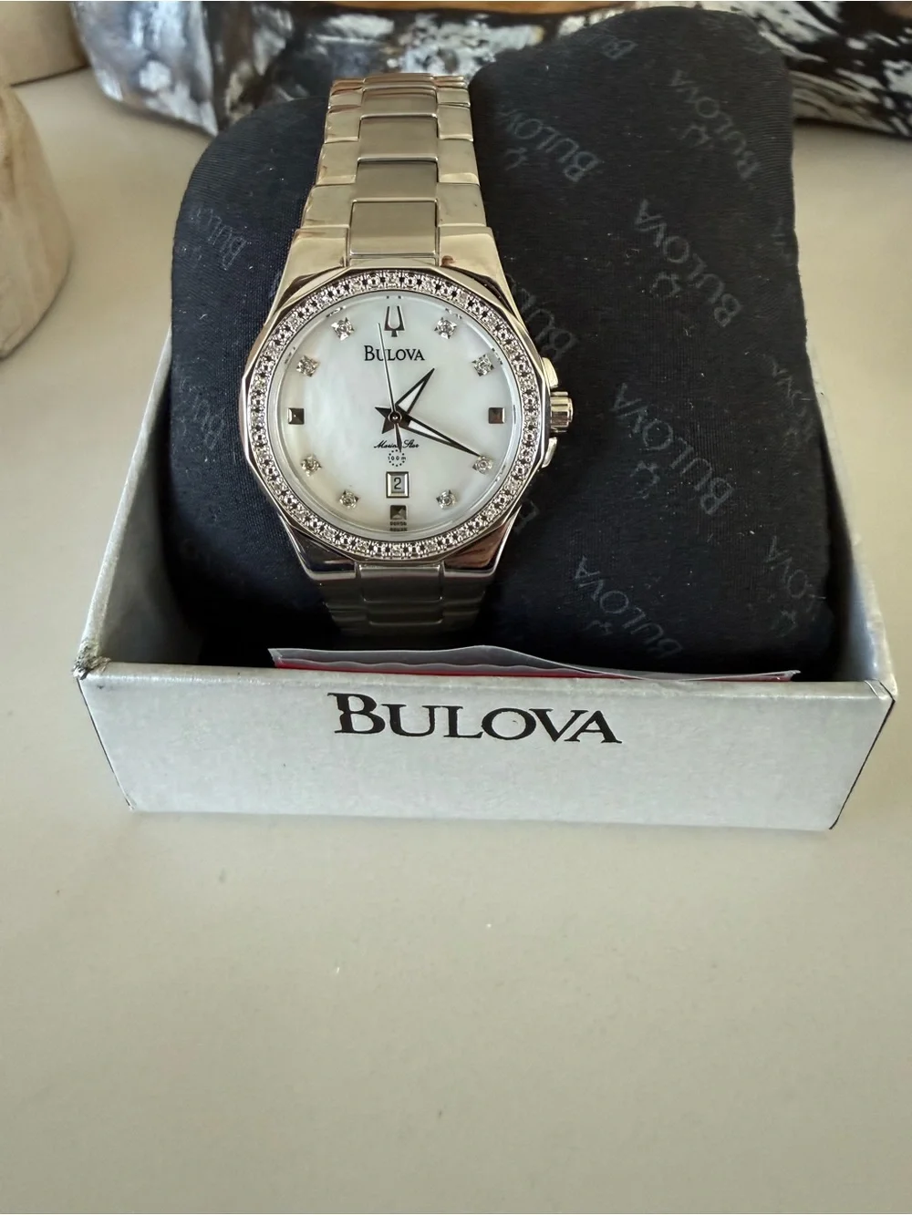 Bulova Silver Watch with White Mother-of-Pearl Dial and Crystal Bezel