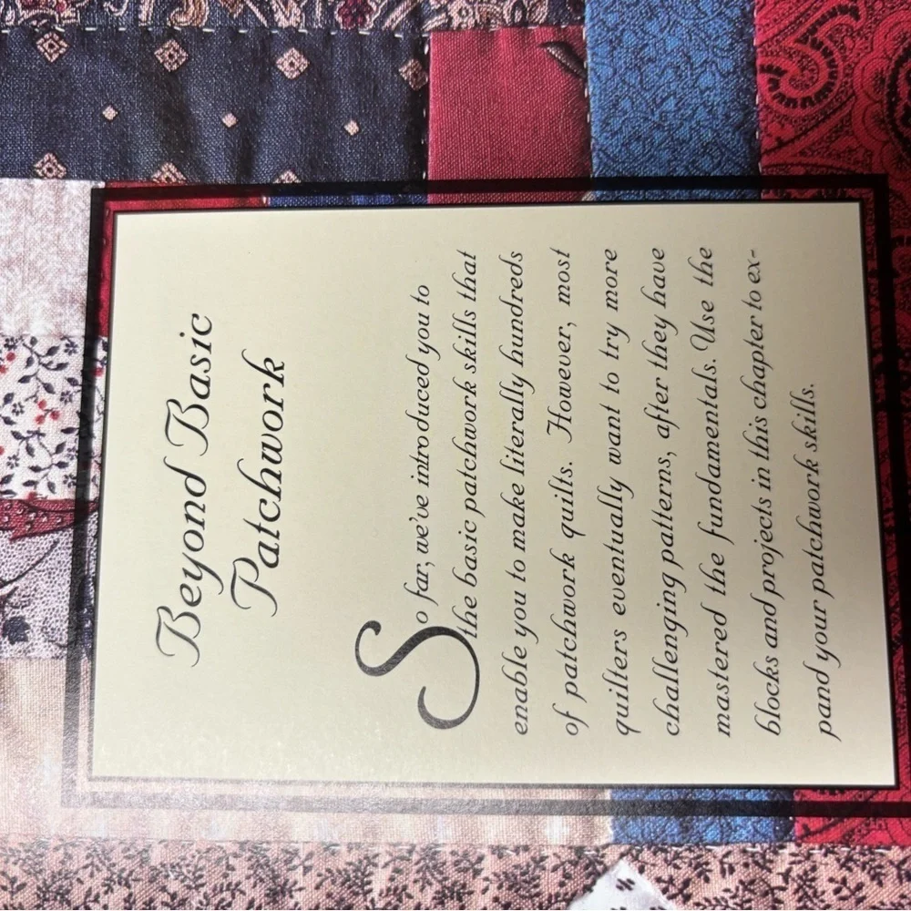 Red and Blue Log Cabin Quilt with Intricate Stitching