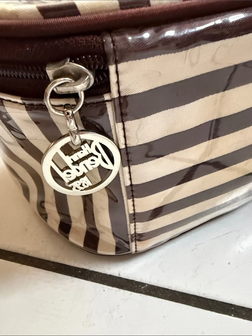 henri bendel vinyl coated