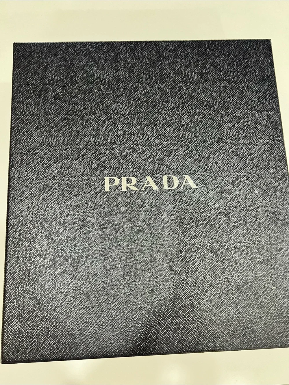 Prada sculptural triangular
